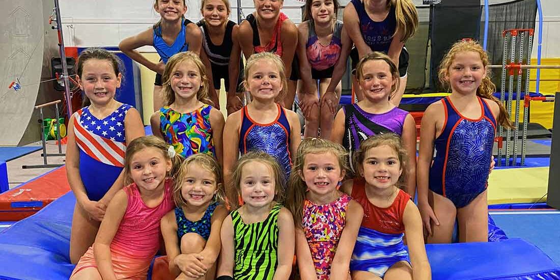 colorful group of young gymnasts